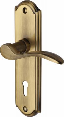 Click Here To Enlarge This Photo Of HOW1300-AT Heritage Brass Door Handle Lever Lock Howard Design Antique Brass Finish