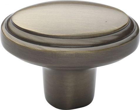 Click Here To Enlarge This Photo Of C3975-AT Heritage Brass Cabinet Knob Stepped Oval Design 41mm Antique Brass Finish