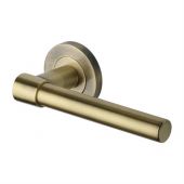 RS2017-AT Heritage Brass Door Handle Lever on Rose Phoenix Design Antique Brass Finish