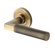 RS2260-AT Heritage Brass Door Handle Lever on Rose Signac (Knurled Bauhaus) Design Antique Brass Finish