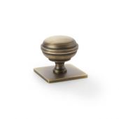 AW826-34-AB - Alexander & Wilks Quantock Cupboard Knob on Square Backplate - Antique Brass