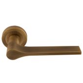 VV5AB - Carlisle Brass Manital 'Vela' Lever on Round Rose - Antique Brass
