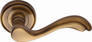 V1601-AT Heritage Brass Door Handle Lever Latch on Round Rose Lisboa Design Antique Brass Finish