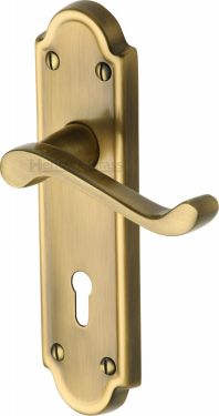 Click Here To Enlarge This Photo Of V300-AT Heritage Brass Door Handle Lever Lock Meridian Design Antique Brass Finish