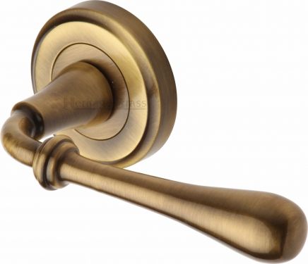 Click Here To Enlarge This Photo Of V7155-AT Heritage Brass Door Handle Lever Latch on Round Rose Roma Design Antique Brass Finish