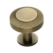 C3958 38-AT Heritage Brass Cabinet Knob Ridge Design with Rose 38mm Antique Brass finish