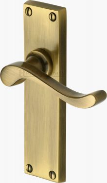 Click Here To Enlarge This Photo Of V803-AT Heritage Brass Door Handle Lever Latch Bedford Design Antique Brass Finish